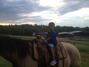 The littlest Moore got to ride the biggest horse!